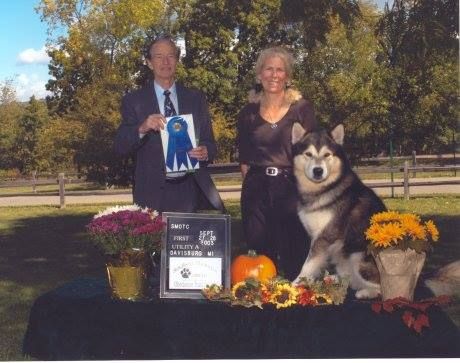 Tilly's sire, Atka (Ch. MACH Arcticdawn's Guardian Spirit UDX MXS MJS OJP XFP WTD WLD WWPDX ROM-WD) with his breeder/owner/handler Raissa Hinman